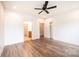 Bedroom with hardwood floors, ceiling fan, and access to a bathroom at 0 6Th Nw St, Hickory, NC 28601