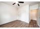 Bedroom with a ceiling fan, closet and wood-look floors at 0 6Th Nw St, Hickory, NC 28601