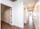 Hallway featuring neutral paint, wood floors, and entryways into rooms at 0 6Th Nw St, Hickory, NC 28601