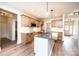 Kitchen featuring an island with stone countertops and modern pendant lighting, and natural wood cabinets at 0 6Th Nw St, Hickory, NC 28601