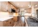 Kitchen featuring natural wood cabinets, stone countertops, and stainless steel appliances at 0 6Th Nw St, Hickory, NC 28601