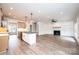 Open floor plan showcasing the living room with a fireplace, built-ins, and light hardwood flooring at 0 6Th Nw St, Hickory, NC 28601