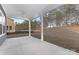 Covered back porch overlooking a landscaped backyard at 10053 Jack Nicklaus Dr # 932, Lancaster, SC 29720