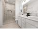 Modern bathroom with a glass-enclosed shower and double vanity, perfect for a luxurious and functional space at 10053 Jack Nicklaus Dr # 932, Lancaster, SC 29720