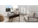 Bright home office features a stylish desk, comfortable seating, and natural light, perfect for productivity and relaxation at 10053 Jack Nicklaus Dr # 932, Lancaster, SC 29720