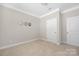 Empty bedroom features carpet floor, and neutral wall paint at 106 Chase Water Dr, Mooresville, NC 28117