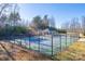 Community pickleball court, fully fenced, offering residents a recreational amenity for social and active lifestyles at 106 Chase Water Dr, Mooresville, NC 28117
