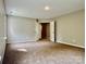 Bedroom featuring carpet and open closet at 11339 Fox Hill Dr, Charlotte, NC 28269