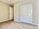 Bedroom with neutral paint, carpet, closet and entry doors at 11339 Fox Hill Dr, Charlotte, NC 28269