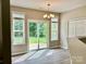 Dining area with sliding glass door providing lots of natural light at 11339 Fox Hill Dr, Charlotte, NC 28269