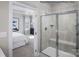 Modern bathroom with a glass-enclosed shower, tile surround, and built-in seat at 1809 Ab Moore Jr Dr # 3238, Indian Trail, NC 28079