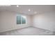 Bright bedroom with plush carpet, natural light from window, and neutral wall color at 2016 Skyhawk Dr, Lake Wylie, SC 29745