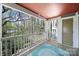 Cozy balcony offers an outdoor space with views of the surrounding trees at 2500 Cranbrook Ln # 5, Charlotte, NC 28207