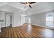 Bright bedroom with a ceiling fan and large window at 2500 Cranbrook Ln # 5, Charlotte, NC 28207