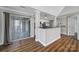 Open floor plan featuring stainless appliances and sliding glass doors at 2500 Cranbrook Ln # 5, Charlotte, NC 28207