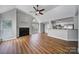 Bright living room featuring fireplace, vaulted ceiling, and breakfast bar at 2500 Cranbrook Ln # 5, Charlotte, NC 28207