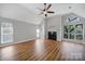 Bright living room featuring fireplace, vaulted ceiling, and lots of windows at 2500 Cranbrook Ln # 5, Charlotte, NC 28207