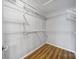 Walk-in closet with wire shelving for clothing and storage at 2500 Cranbrook Ln # 5, Charlotte, NC 28207