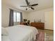 Bright bedroom with neutral walls, a work space and large window with natural light at 2900 Heathstead Pl # A, Charlotte, NC 28210