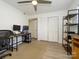 Office featuring carpet, a desk, and bright white walls at 2900 Heathstead Pl # A, Charlotte, NC 28210