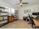 Functional office space with hardwood floors, a stylish desk, and built-in shelving at 2900 Heathstead Pl # A, Charlotte, NC 28210