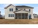 The backyard features a screened porch and a view of the neighborhood at 304 Balboa St, Matthews, NC 28104