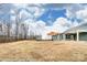 Expansive backyard with potential for landscaping and outdoor activities, bordered by trees at 3056 Bent Willow Dr # 175, Indian Trail, NC 28079