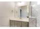 Modern bathroom with gray vanity, quartz countertop, and a large mirror showing the tiled shower at 3056 Bent Willow Dr # 175, Indian Trail, NC 28079