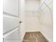 Walk-in closet featuring metal shelving and neutral carpeting at 3056 Bent Willow Dr # 175, Indian Trail, NC 28079