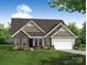 Charming home with stone and siding exterior, well-manicured lawn and beautiful landscaping at 3056 Bent Willow Dr # 175, Indian Trail, NC 28079