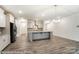 Kitchen boasts granite countertops, stainless appliances and gray cabinets at 3056 Bent Willow Dr # 175, Indian Trail, NC 28079
