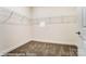 Carpeted walk-in closet with wire shelving for storage at 3056 Bent Willow Dr # 175, Indian Trail, NC 28079