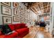 Inviting living room with a large wall for displaying art and exposed wood beam ceiling at 310 Arlington Ave # Multiple, Charlotte, NC 28203