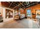 Comfortable bedroom featuring exposed brick, wood ceilings and large windows for great natural light at 310 Arlington Ave # Multiple, Charlotte, NC 28203