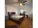 Comfortable bedroom with hardwood floors, natural light, and ceiling fan at 3367 Marshall Wolfe Rd, Kings Mountain, NC 28086