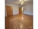 Spacious bedroom features gleaming hardwood floors and a closet for ample storage at 3367 Marshall Wolfe Rd, Kings Mountain, NC 28086