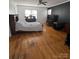 Primary bedroom with hardwood floors, natural light, and closet space at 3367 Marshall Wolfe Rd, Kings Mountain, NC 28086