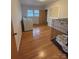 Laundry room with hardwood floors and natural light at 3367 Marshall Wolfe Rd, Kings Mountain, NC 28086