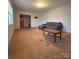 Inviting living room with new floors, a comfortable sofa, and natural lighting at 3367 Marshall Wolfe Rd, Kings Mountain, NC 28086