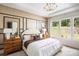 Serene bedroom with natural light, stylish decor, and a view of the outdoors at 3468 Aleppo Ave # 366, Indian Land, SC 29707