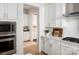 Well-equipped kitchen with white cabinets, stainless steel appliances, and hardwood floors at 3468 Aleppo Ave # 366, Indian Land, SC 29707