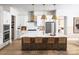 Modern kitchen boasts a large island with barstool seating and stainless steel appliances at 3468 Aleppo Ave # 366, Indian Land, SC 29707