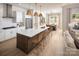 Open kitchen concept with a large island, stainless steel appliances, and an adjacent dining area at 3468 Aleppo Ave # 366, Indian Land, SC 29707