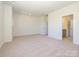 Bedroom featuring neutral carpet, recessed lighting and ensuite bathroom at 3924 Craig Ave, Charlotte, NC 28211
