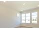 Bright bedroom with ample natural light and neutral carpet at 3924 Craig Ave, Charlotte, NC 28211