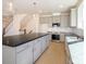 Modern kitchen with stainless steel appliances, granite countertops, and a central island at 3924 Craig Ave, Charlotte, NC 28211