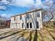 Back exterior of two-story home, with a two-car garage and a door to the backyard at 414 Fox Fire Run, Gastonia, NC 28052