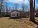Charming single-story home with a brick facade, white siding and black shutters at 414 Fox Fire Run, Gastonia, NC 28052