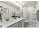 The full bathroom features a double sink, shower-tub combination, and vanity with lots of storage space at 419 Balboa St, Matthews, NC 28104