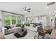 Open-concept living room flowing into a kitchen with a large center island at 419 Balboa St, Matthews, NC 28104